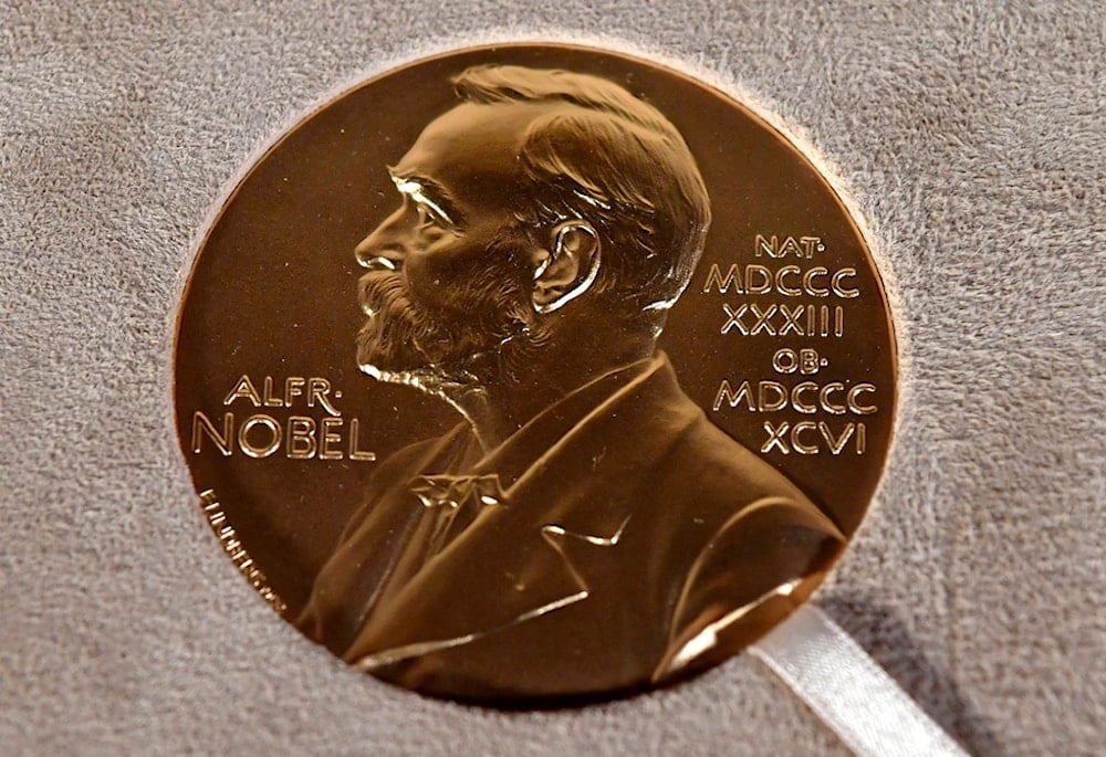 FILE - A Nobel medal is displayed during a ceremony in New York on Dec. 8, 2020. (Angela Weiss/Pool Photo via AP, File)