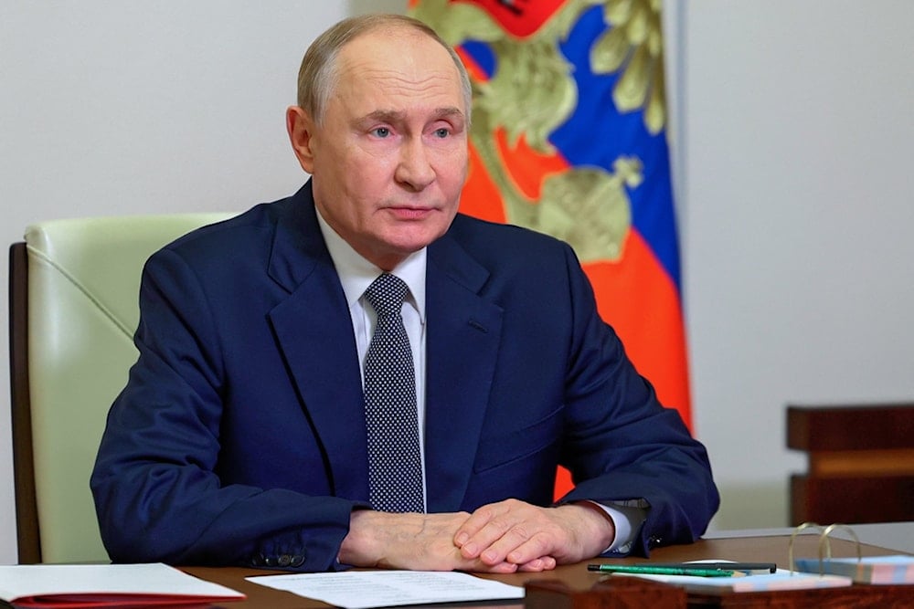 Russian President Vladimir Putin chairs a Security Council meeting via videoconference at the Novo-Ogaryovo residence outside Moscow, Tuesday, Oct. 7, 2025. (AP)