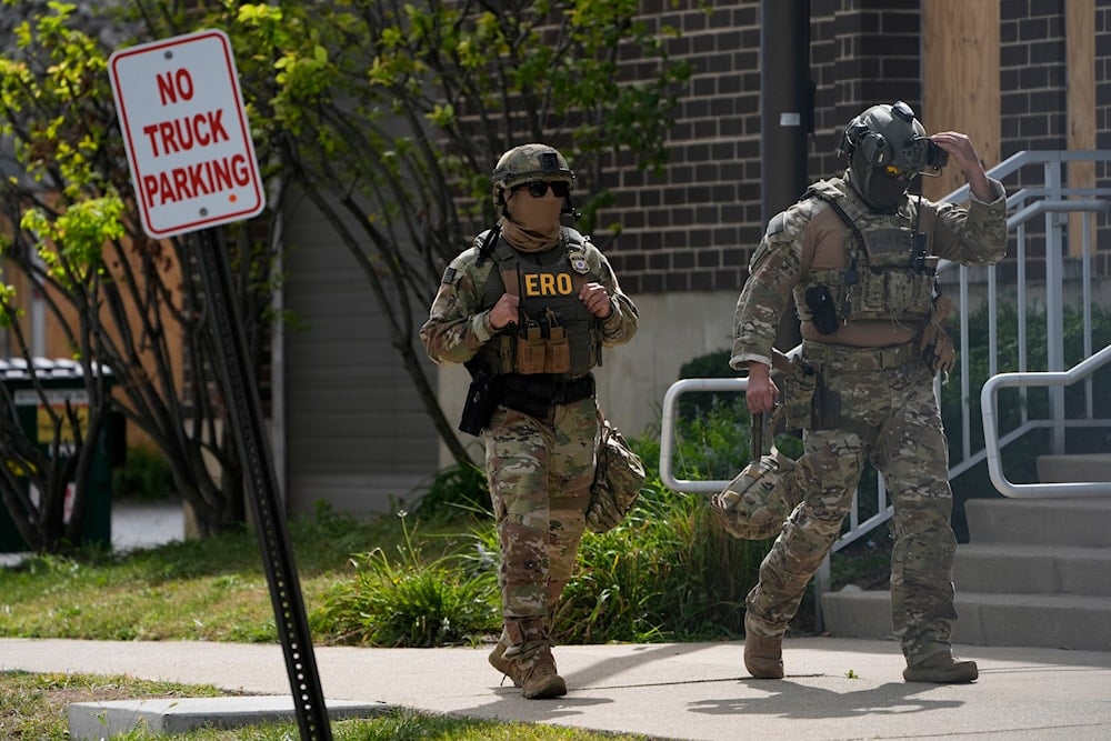 Enforcement and Removal Operations agents walk outside the U.S. Immigration and Customs Enforcement (ICE) building Wednesday, Sept. 24, 2025, in Broadview, Ill (AP)