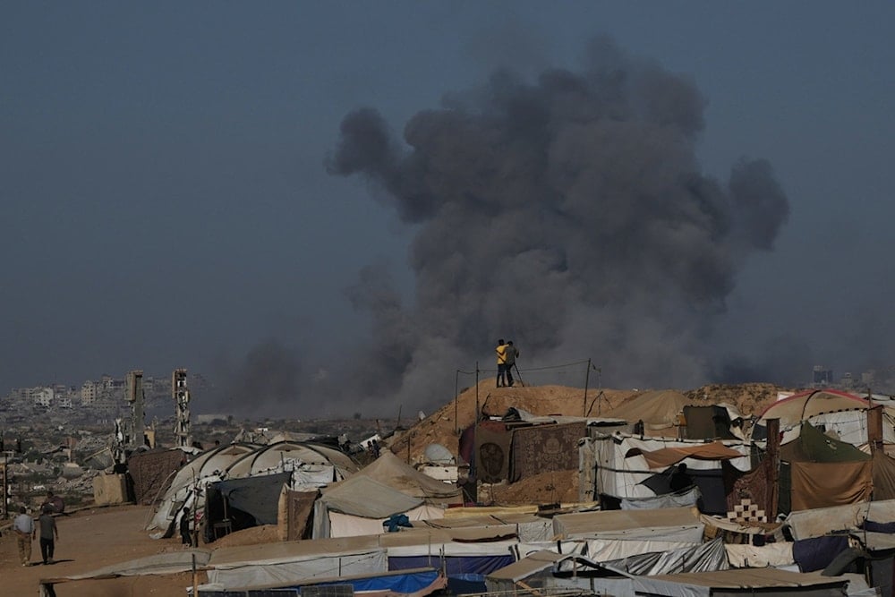 Smoke rises following an Israeli military strike in Gaza City as seen from the central Gaza Strip, Wednesday, October 8, 2025. (AP)