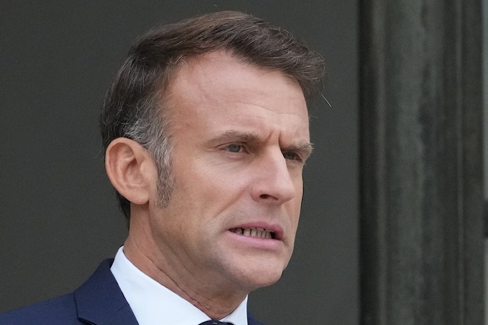 French President Emmanuel Macron waits for Jordan's Crown Prince Hussein at the presidential Elysee Palace, Wednesday, Oct. 8, 2025 in Paris. (AP Photo/Michel Euler)