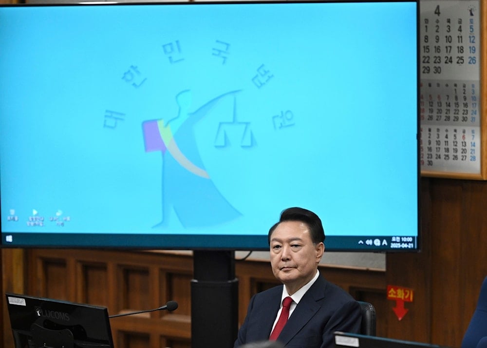 South Korea's ousted President Yoon Suk Yeol attends his criminal trial at a courtroom of the Seoul Central District Court in Seoul Monday, April 21, 2025. (Jung Yeon-je/Pool Photo via AP)