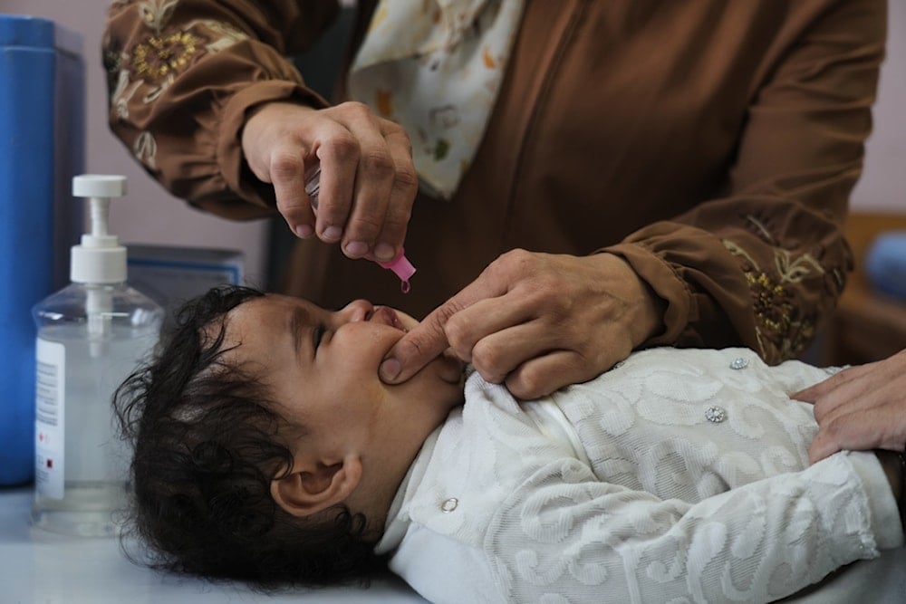 Palestinian children under age 3 receive vaccinations provided by UNICEF and Palestinian Red Crescent at a health center in Gaza City, Sunday, November 9, 2025 (AP) 