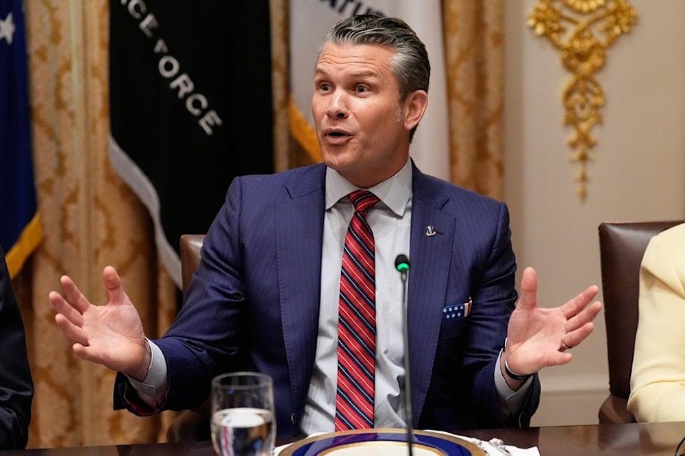 Defense Secretary Pete Hegseth speaks during a meeting with President Donald Trump and Argentina's President Javier Milei in the Cabinet Room of the White House, Tuesday, October 14, 2025, in Washington (AP)