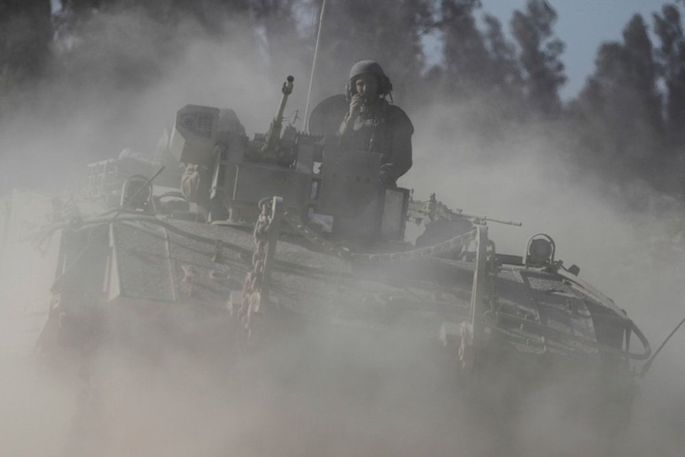 Israeli troops move along the Gaza Strip, in southern occupied Palestine, Thursday, May 8, 2025 (AP)