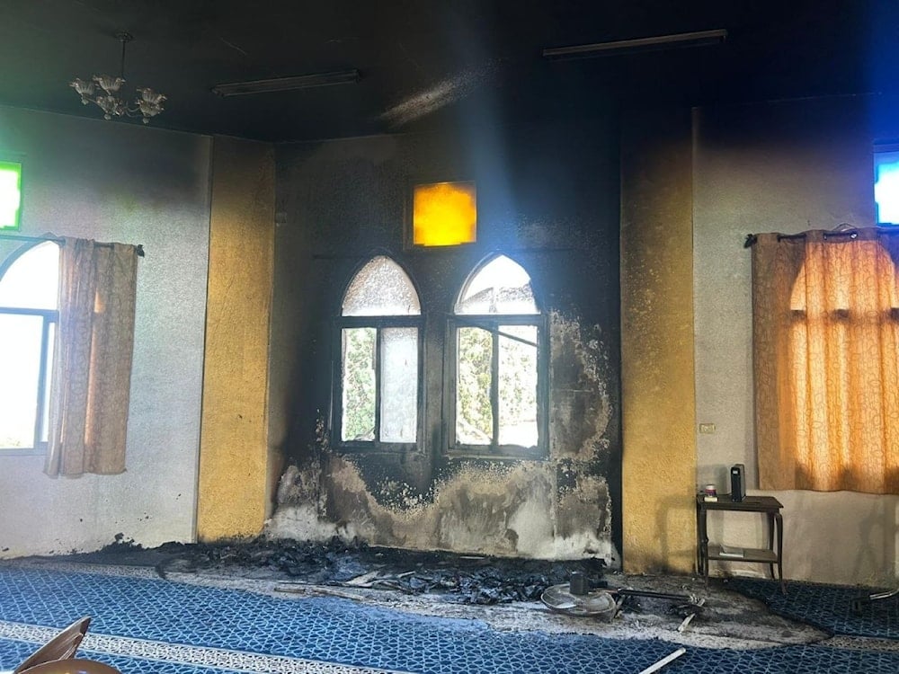 Hamas condemns settlers torching West Bank mosque