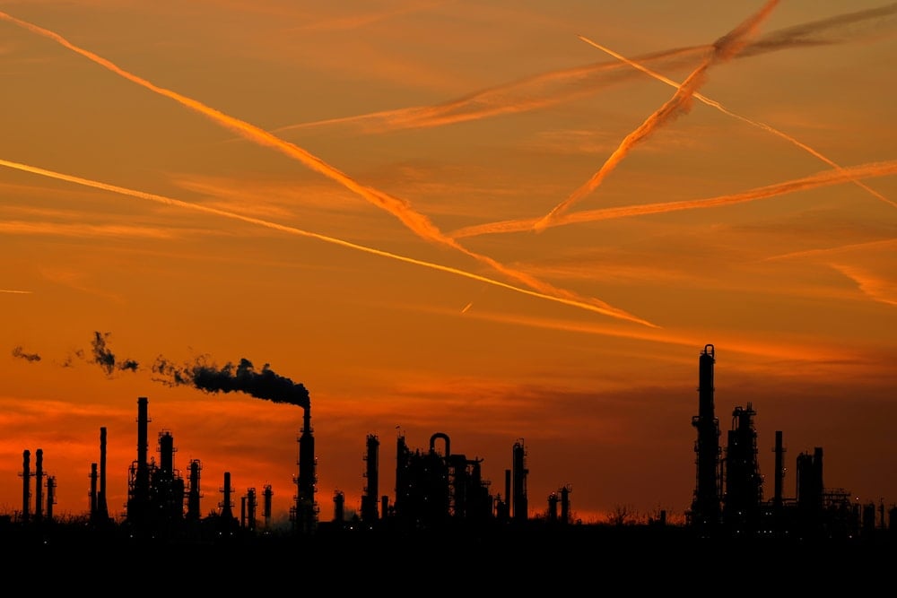The HF Sinclair El Dorado oil refinery is silhouetted against the sky at sunset Friday, March 21, 2025, in El Dorado, Kan (AP)