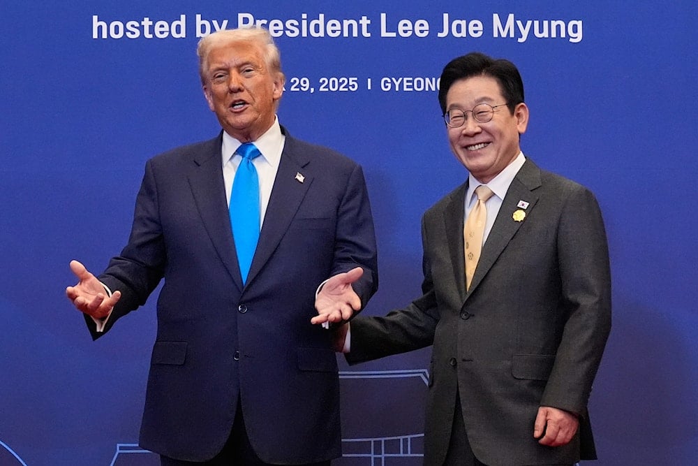 President Donald Trump poses for a photo with South Korean President Lee Jae Myung during a dinner event in Gyeongju, South Korea, Wednesday, Oct. 29, 2025 (AP)