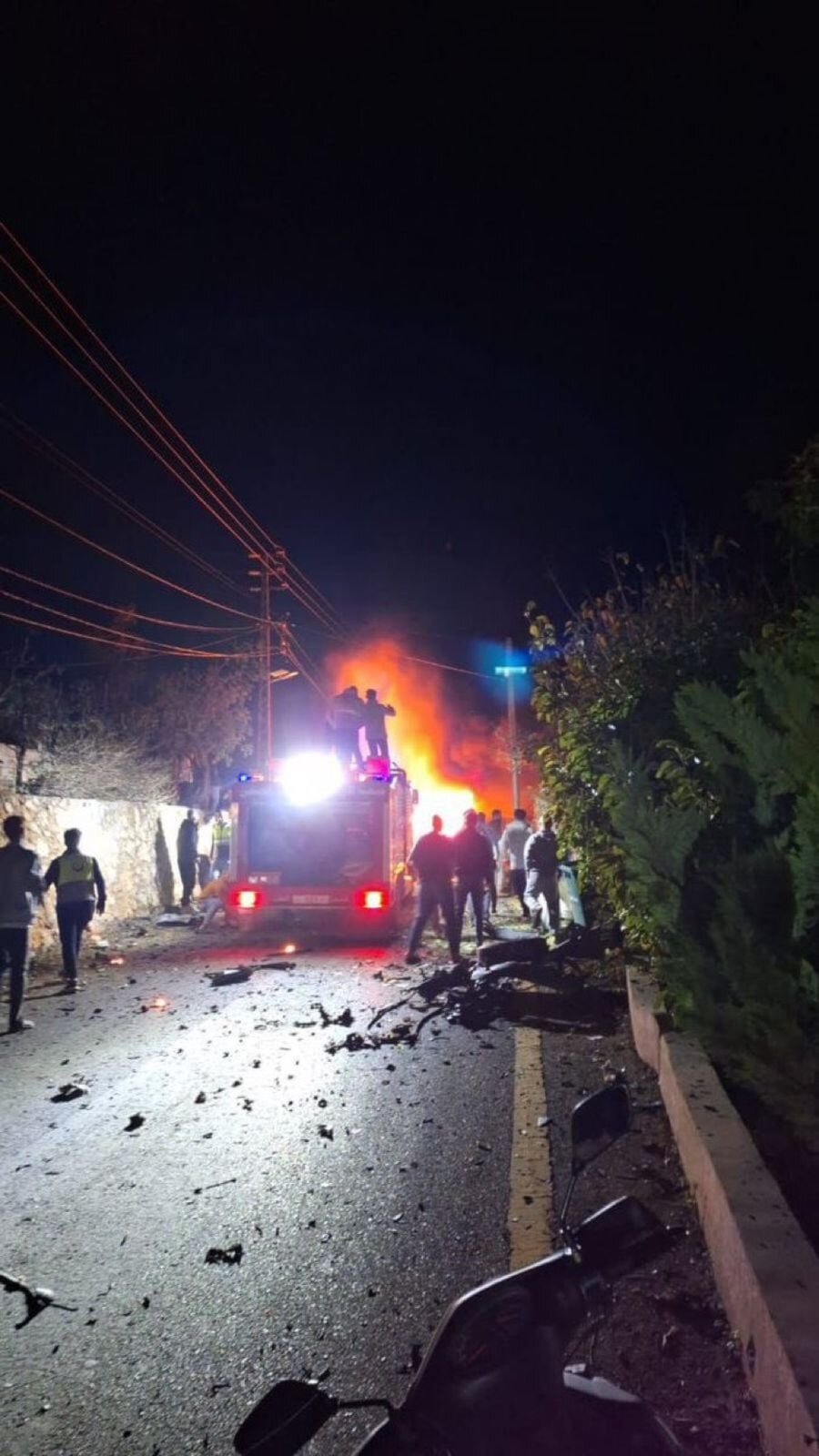 Fire billows after an Israeli drone strikes that killed the principal of the Mansouri School, Mansouri, Lebanon, November 16, 2025 (social media)