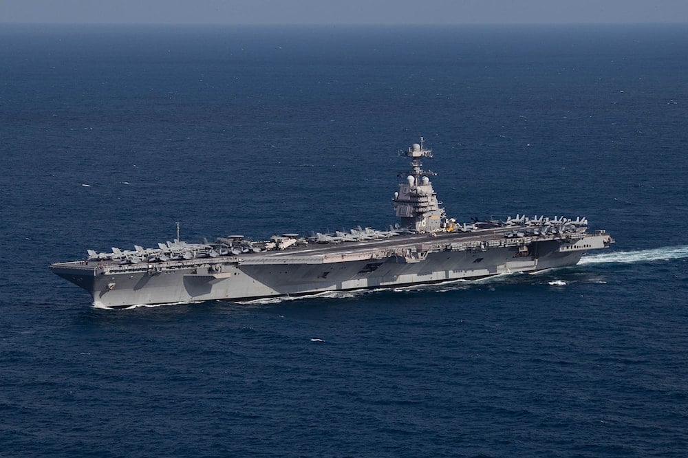 The US Navy aircraft carrier USS Gerald R. Ford (CVN-78) steams the Atlantic Ocean during a simulated straits transit with the Gerald R. Ford Carrier Strike Group (GRFCSG) in the Atlantic Ocean, October 9 2022. (US Navy)
