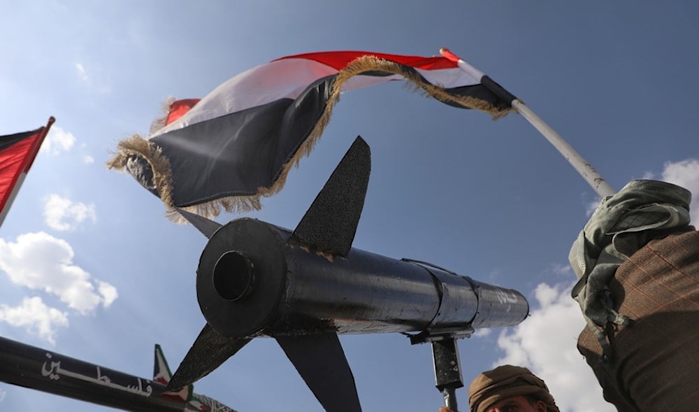 A Yemeni chants slogans as he carries a rocket during a rally in Sanaa, Yemen, following Israeli airstrikes in Sanaa, Yemen, Sept. 26, 2025. (AP)