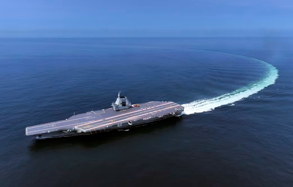 China's third conventionally powered aircraft carrier, the Fujian, conducts a maiden sea trial on May 7, 2024. (AP)