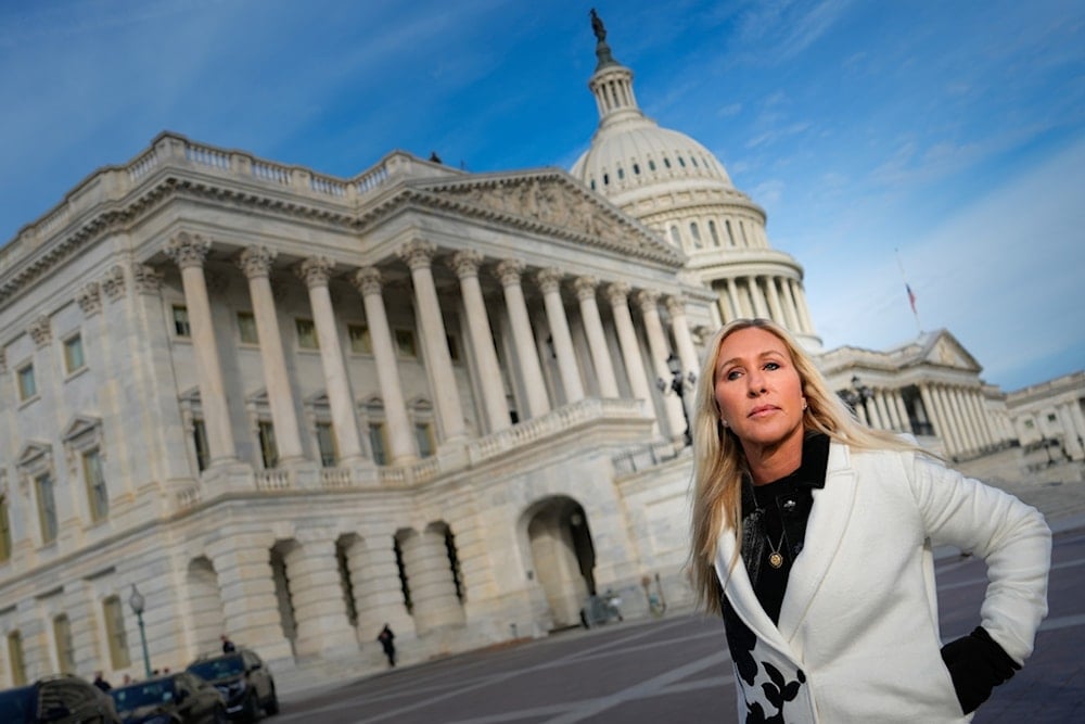 Rep. Marjorie Taylor Greene, R-Ga., arrives to a news conference on the Epstein Files Transparency Act, Tuesday, Nov. 18, 2025, outside the US Capitol in Washington. (AP Photo/Julia Demaree Nikhinson)