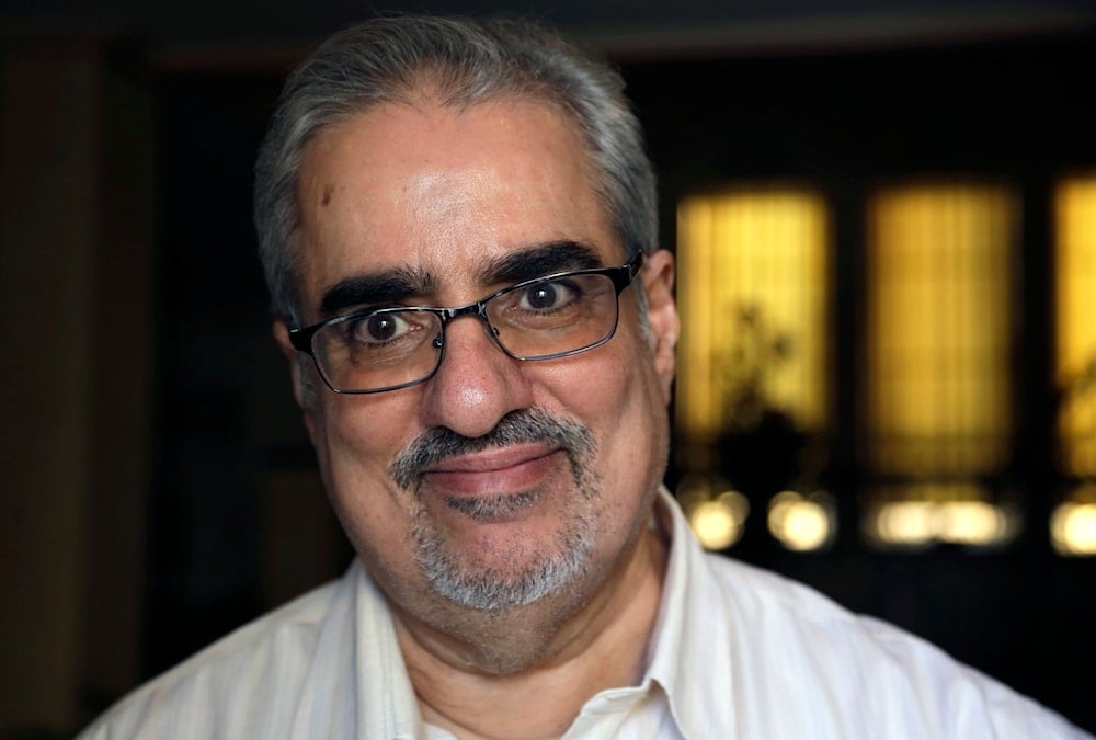 Bahraini Sunni Muslim opposition leader Ibrahim Sharif, who led the opposition National Democratic Action Society group, smiles to journalists at his home following his overnight release from prison, in Tubli, Bahrain, Saturday, June 20, 2015 (AP)