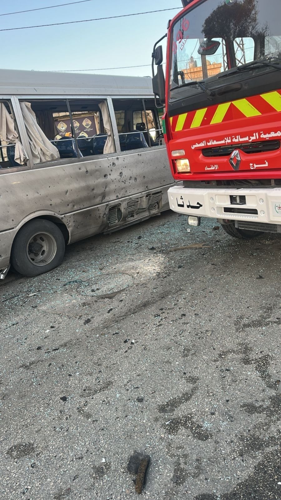 A damaged bus can be seen after an Israeli airstrike targeted a car in at-Tiri, Lebanon, November 19, 2025 (social media)