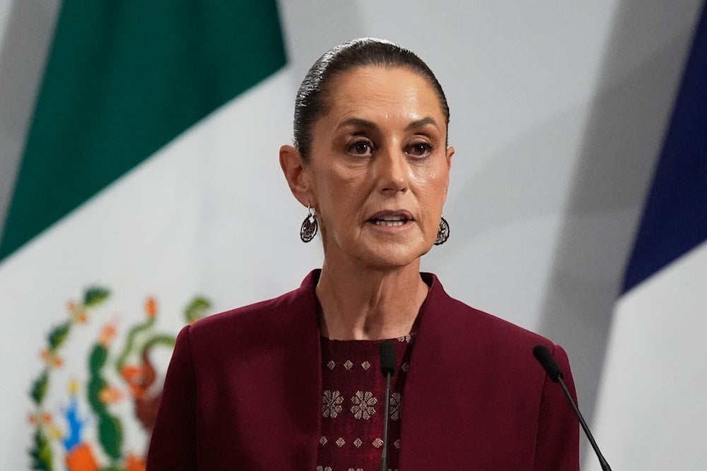 Mexican President Claudia Sheinbaum giveS a joint news conference with France's President Emmanuel Macron at the National Palace in Mexico City, Friday, Nov. 7, 2025 (AP)