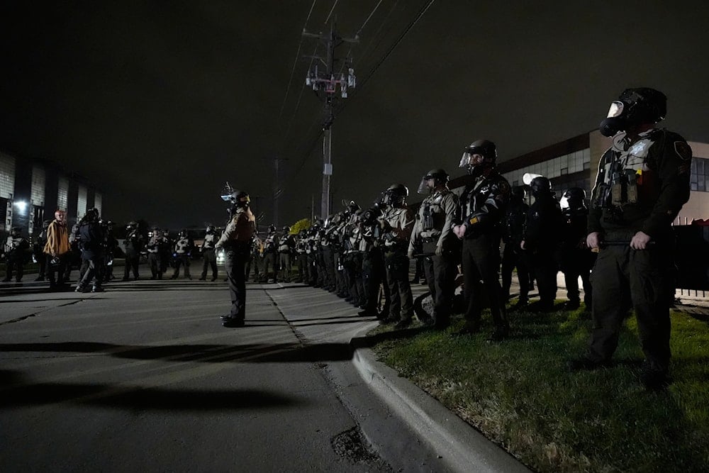 Law enforcement standoff with protesters outside an ICE processing facility in the Chicago suburb of Broadview, Ill., Saturday, Nov. 1, 2025 (AP)