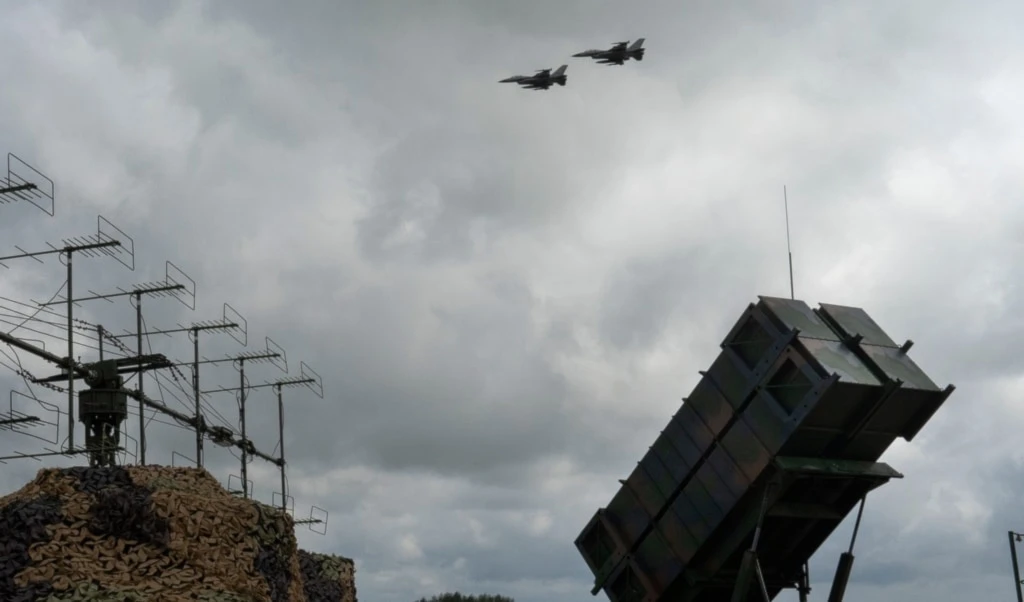 The Ukrainian Air Force's F-16 fighter jets fly over a Patriot Air and Missile Defense System in an undisclosed location in Ukraine, Sunday, Aug. 4, 2024.  (AP)