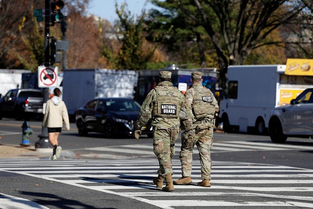 National Guard soldiers patrol on the National Mall, Thursday, November 13, 2025, in Washington (AP)