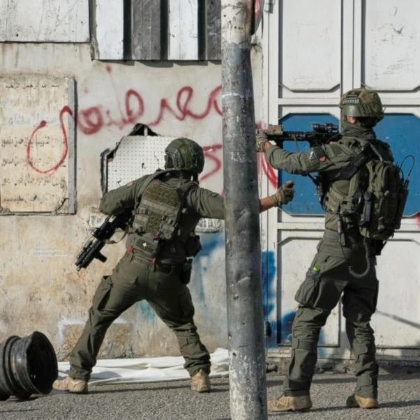 Israeli occupation soldiers during a military raid in the Palestinian West Bank city of Nablus, Thursday, Nov. 20, 2025. (AP Photo/Majdi Mohammad)