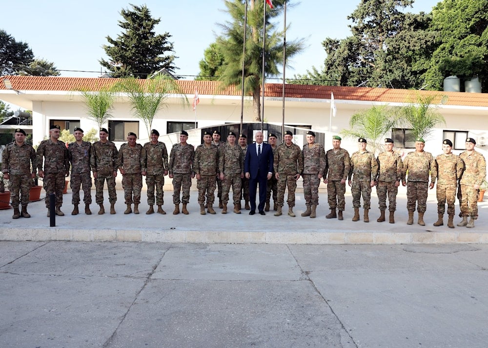 Lebanese President Joseph Aoun stands with Lebanese Army senior officers during a visit to the Benoit Barrack in Tyre, Lebanon, November 21, 2025 (X/ @LBPresidency)