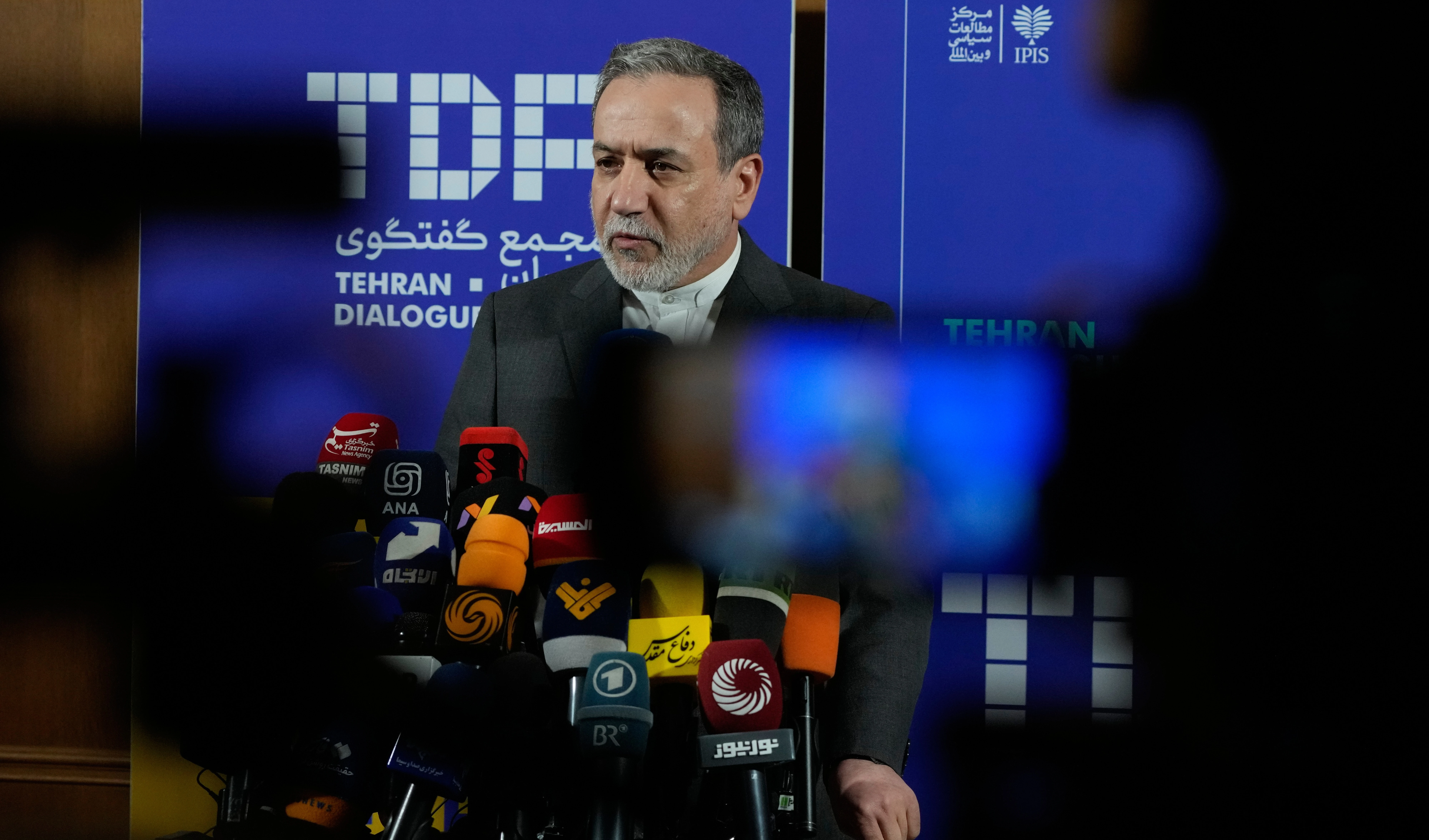 Iranian Foreign Minister Abbas Araghchi speaks in a new briefing after attending a conference titled "International Law Under Assault: Aggression and Self-Defense," in Tehran, Iran, Sunday, Nov. 16, 2025 (AP)