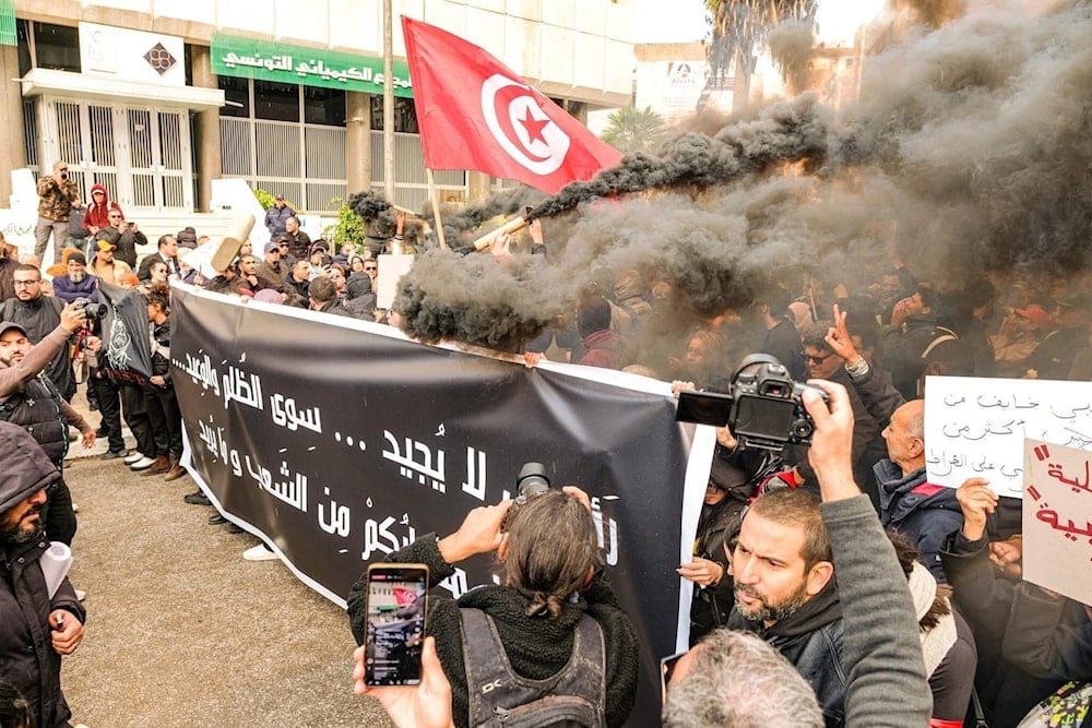 Protesters hold banners against the Tunisian President Kais Saied in Tunis, Tunisia, November 22, 2025 (social media)