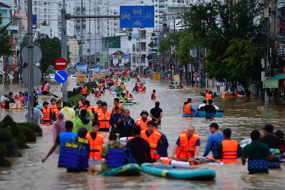 Floods ravage Vietnam, killing at least 55 people.