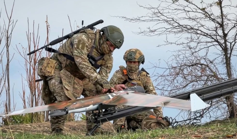 Russian soldiers prepare a drone for reconnaissance of Ukrainian positions on an undisclosed location in Ukraine, on Thursday, November 6, 2025,  (AP)