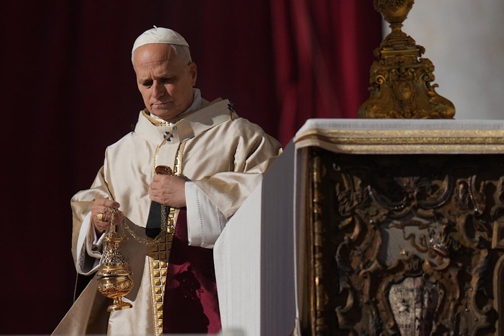 Pope Leo XIV celebrates a Mass for the Jubilee of the Choirs in St. Peter's Square, at the Vatican, Sunday, Nov. 23, 2025.(AP Photo/Alessandra Tarantino)