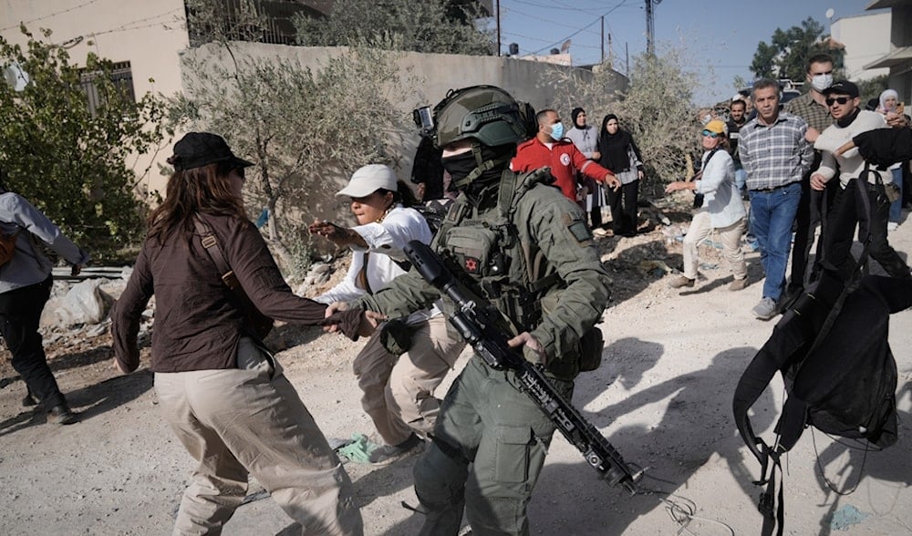 Israeli soldiers attack Palestinians in the Nur Shams refugee camp, in the West Bank city of Tulkarm, Nov. 23, 2025. (AP)