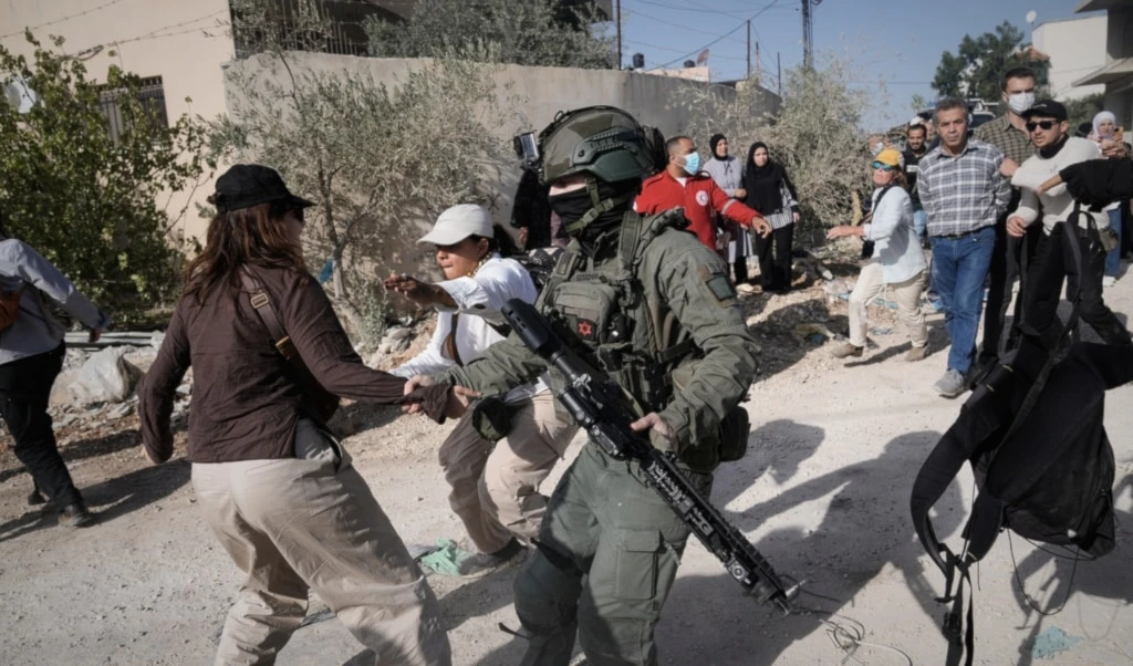Israeli soldiers attack Palestinians in the Nur Shams refugee camp, in the West Bank city of Tulkarm, Nov. 23, 2025. (AP)