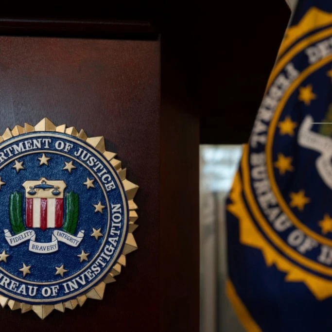 An FBI seal is displayed on a podium before a news conference at the field office in Portland, Ore., Thursday, Jan. 16, 2025. (AP Photo/Jenny Kane)