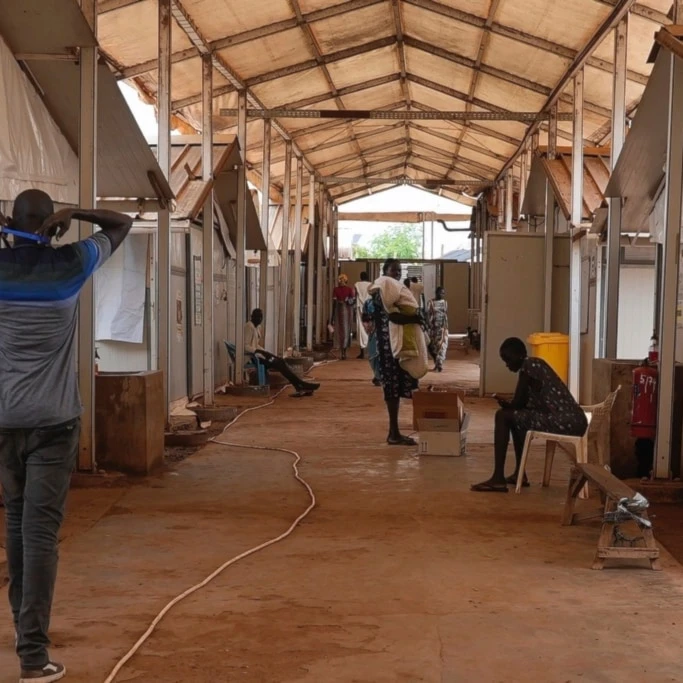 Patients and staff sit and walk around in the Doctors Without Borders-run hospital in Bentiu, South Sudan, Monday, June 24, 2024 (AP)
