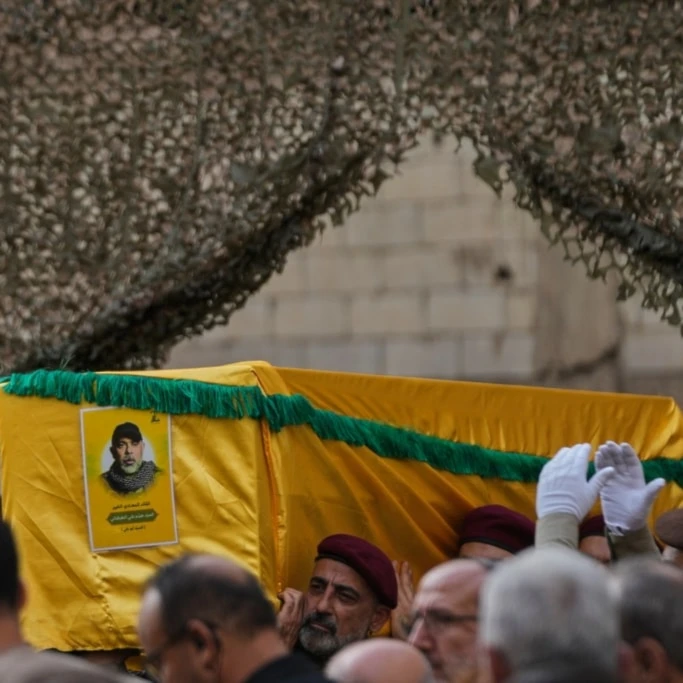 Hezbollah fighters carry the coffin of Hezbollah Chief of Staff Haytham Tabtabai during his funeral procession in the southern suburb of Beirut, Lebanon, Monday, November 24, 2025 (AP)