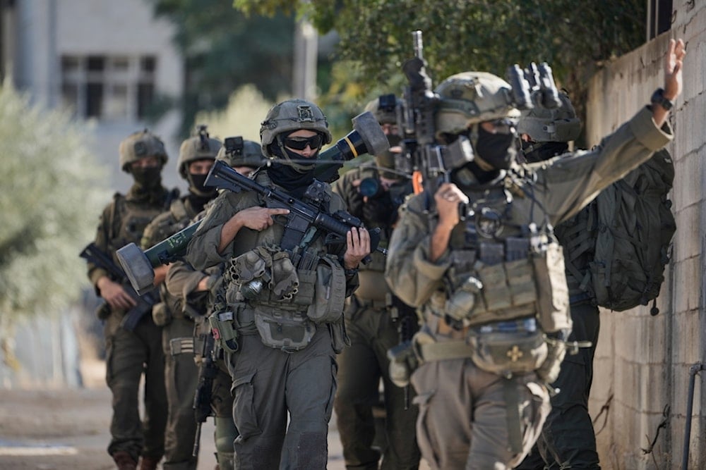 Israeli soldiers are seen during an Israeli occupation forces raid in the West Bank town of Tubas, Wednesday, Nov. 26, 2025 (AP)