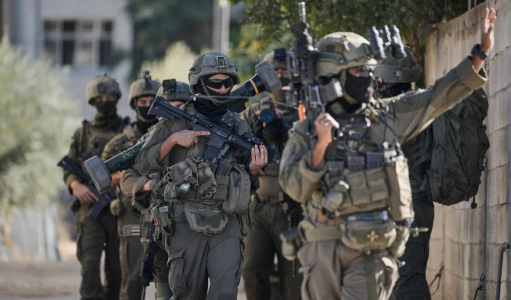 Israeli soldiers are seen during an Israeli occupation forces raid in the West Bank town of Tubas, Wednesday, Nov. 26, 2025 (AP)