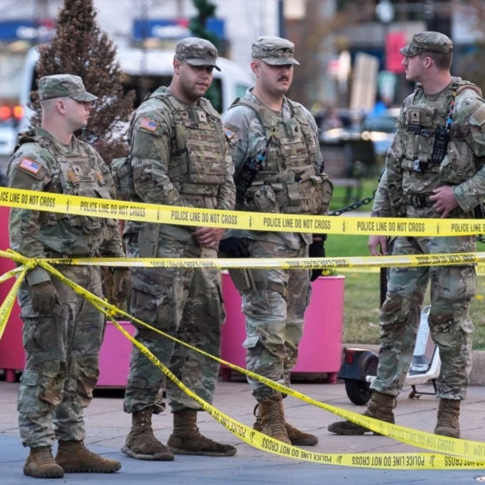 National Guard members are seen after reports of two National Guard soldiers shot near the White House in Washington, Wednesday, November 26, 2025 (AP)