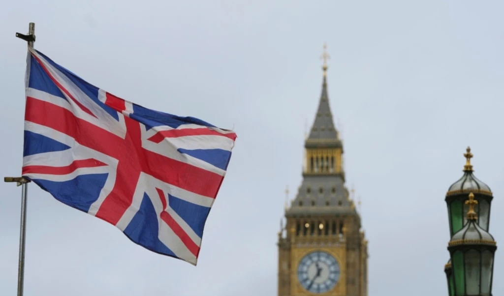 A Union flag flies near Big Ben in London, Friday, Jan. 31, 2025, on the 5th anniversary after the U.K. officially left the European Union. (AP Photo/Kirsty Wigglesworth)