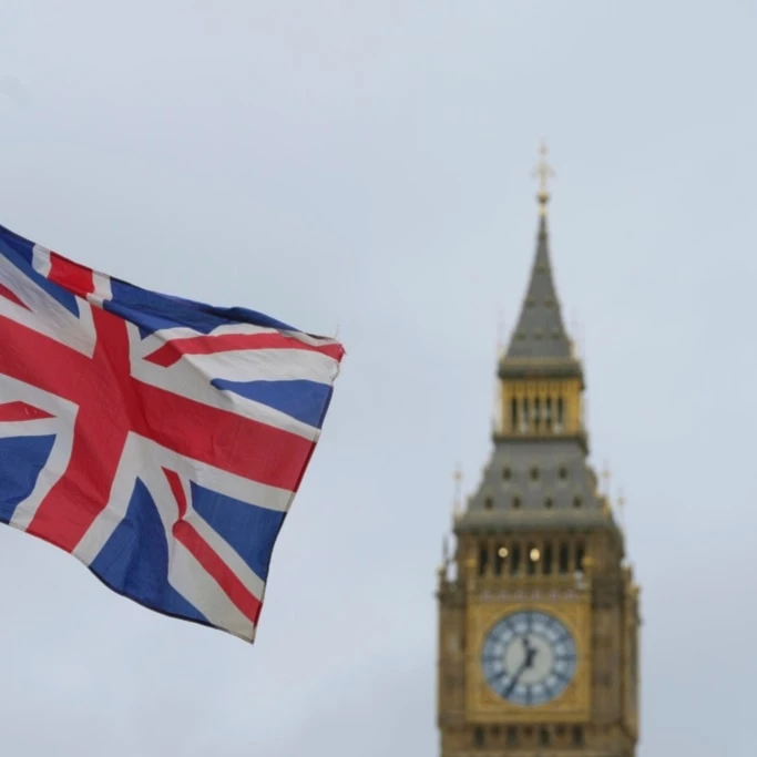 A Union flag flies near Big Ben in London, Friday, Jan. 31, 2025, on the 5th anniversary after the U.K. officially left the European Union. (AP Photo/Kirsty Wigglesworth)