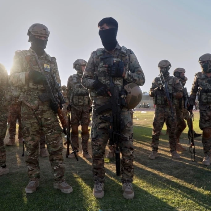 Fighters from the US-backed Syrian Democratic Forces (SDF) prepare to attend a military parade in Qamishli, northeastern Syria, Tuesday, August 12, 2025 (AP)