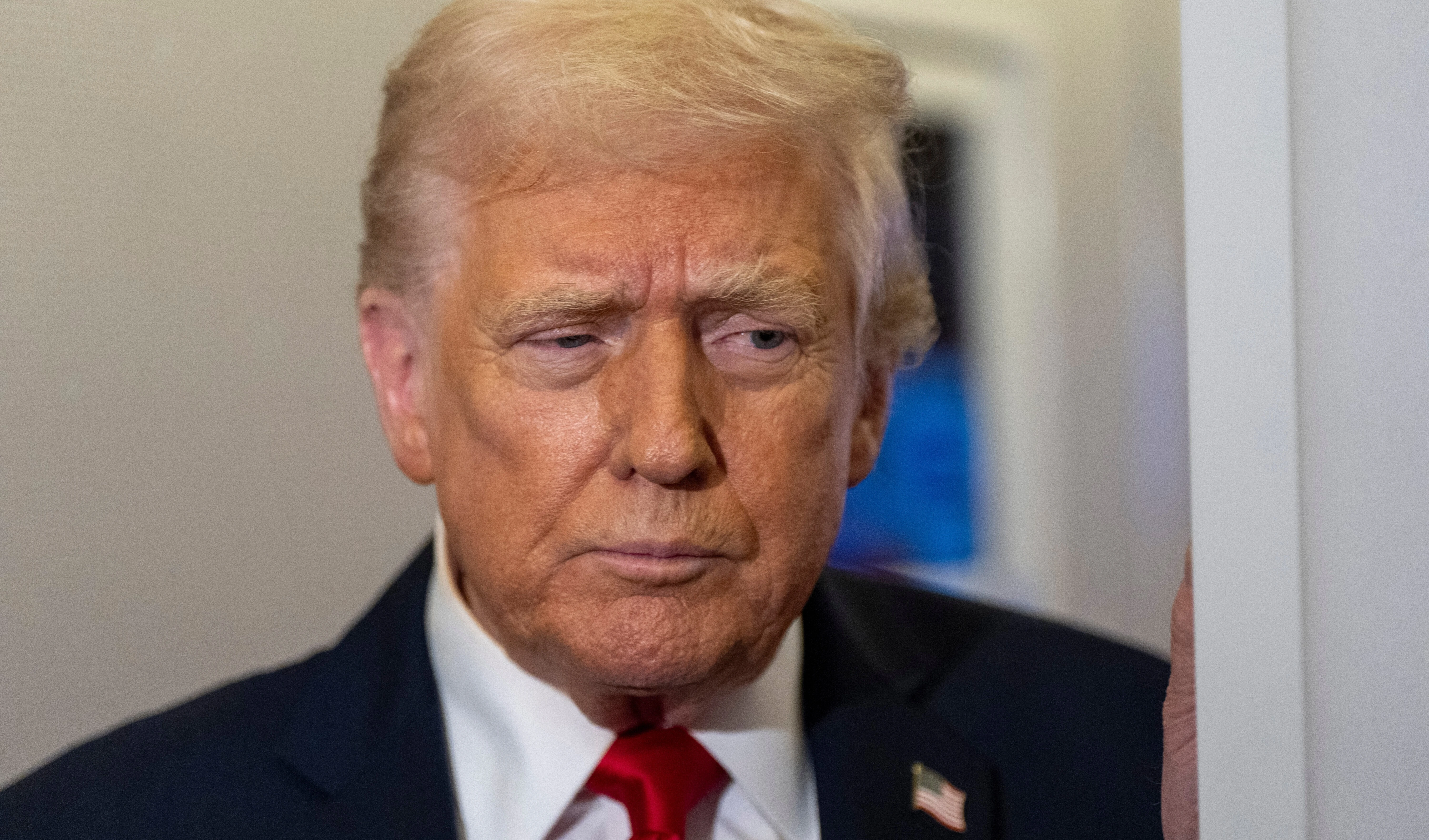 President Donald Trump speaks with reporters while in flight on Air Force One from Joint Base Andrews to his Mar-a-Lago estate in Palm Beach, Fla., on November 25, 2025. (AP Photo/Alex Brandon)