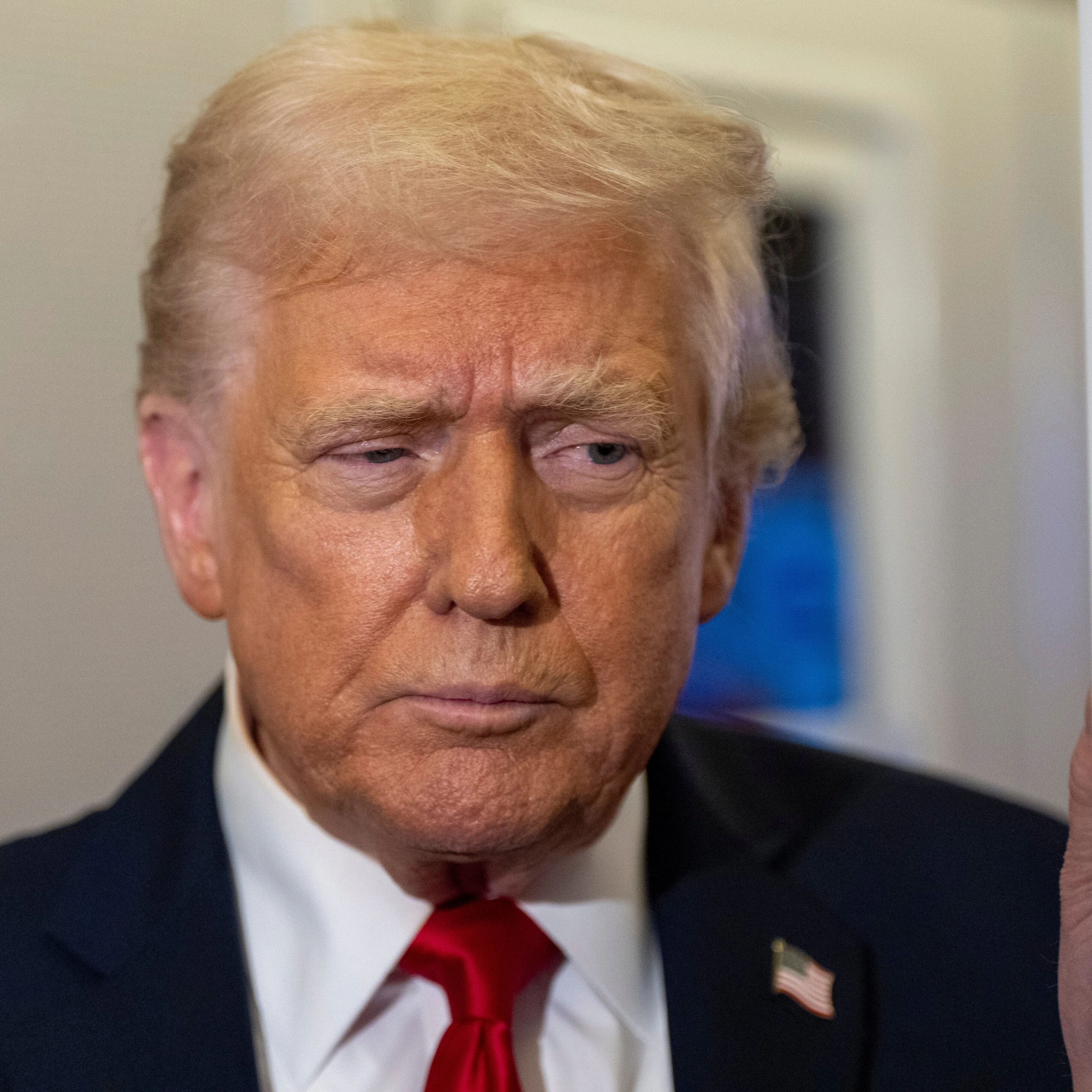 President Donald Trump speaks with reporters while in flight on Air Force One from Joint Base Andrews to his Mar-a-Lago estate in Palm Beach, Fla., on November 25, 2025. (AP Photo/Alex Brandon)