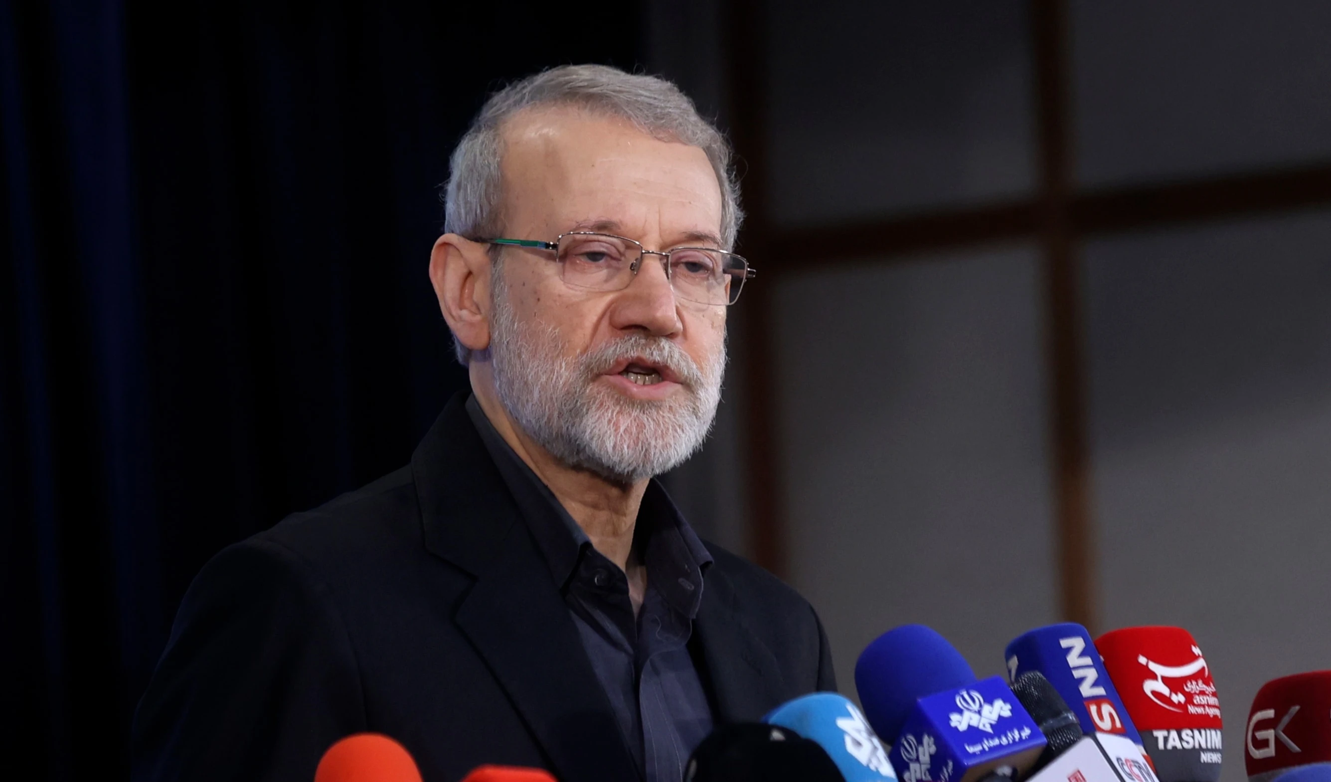Secretary of Iran's Supreme National Security Council Ali Larijani speaks with media after registering his name as a candidate for the June 28 presidential elections at the Interior Ministry in Tehran, Iran, May 31, 2024 (AP)