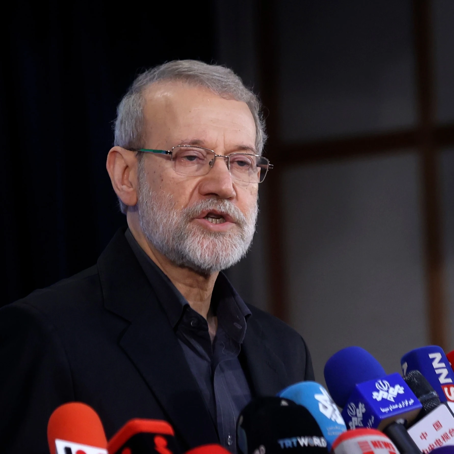 Secretary of Iran's Supreme National Security Council Ali Larijani speaks with media after registering his name as a candidate for the June 28 presidential elections at the Interior Ministry in Tehran, Iran, May 31, 2024 (AP)