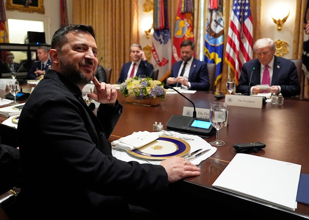 Ukraine's President Volodymyr Zelenskyy, sits before a meeting with President Donald Trump, Vice President JD Vance and Treasury Secretary Scott Bessent in the Cabinet Room of the White House, Friday, Oct. 17, 2025, in Washington (AP)