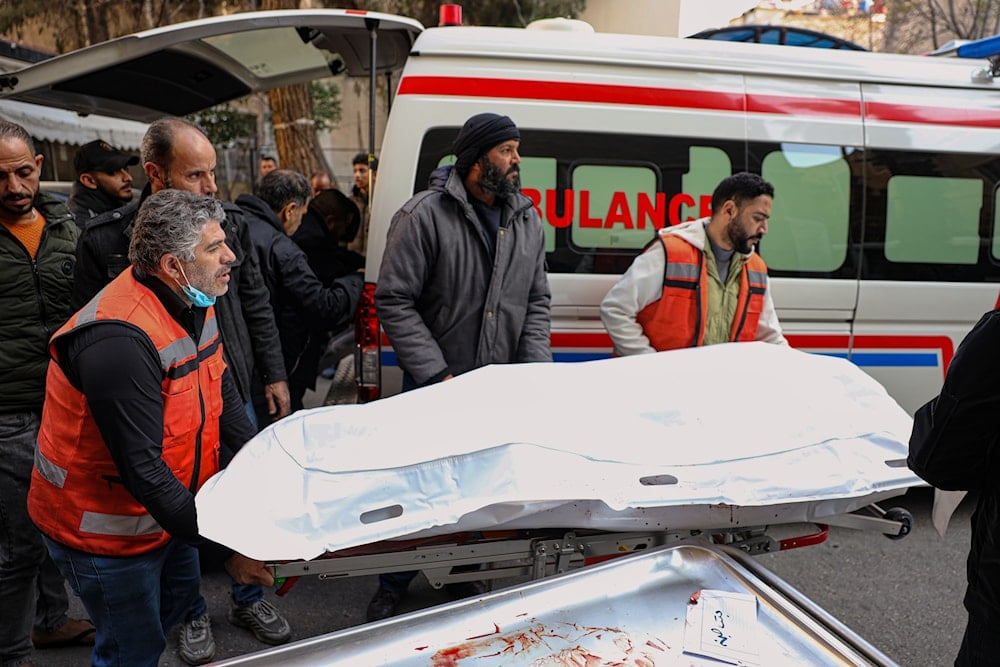 The body of one of the victims of an Israeli occupation forces raid in the southern Syrian village of Beit Jin is brought to Al-Mowasat Hospital in Damascus, Friday, Nov. 28, 2025. (AP)
