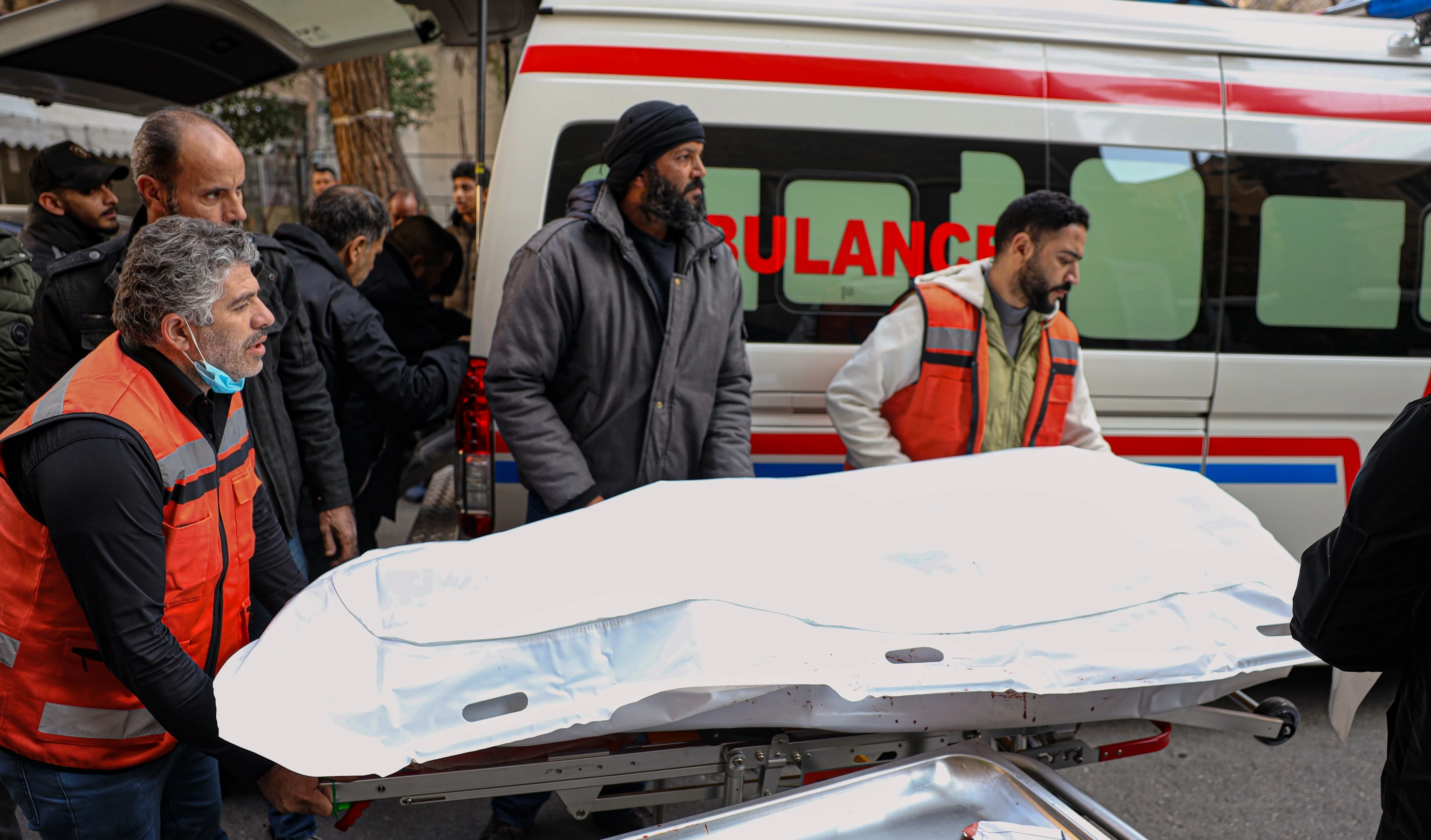 The body of one of the victims of an Israeli occupation forces raid in the southern Syrian village of Beit Jin is brought to Al-Mowasat Hospital in Damascus, Friday, Nov. 28, 2025. (AP)