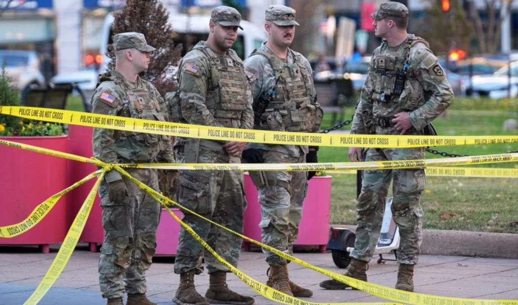 National Guard are seen after reports of two National Guard soldiers shot near the White House in Washington, Wednesday, November 26, 2025. (AP Photo/Evan Vucci)