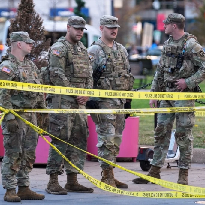 National Guard are seen after reports of two National Guard soldiers shot near the White House in Washington, Wednesday, November 26, 2025. (AP Photo/Evan Vucci)